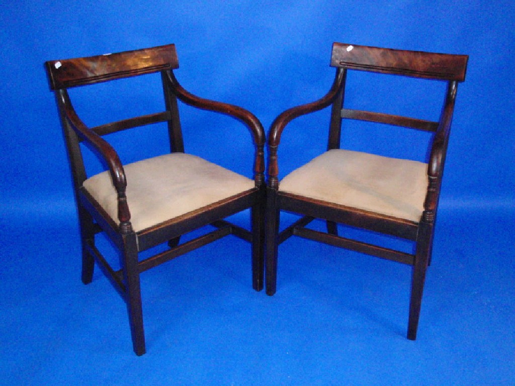 Appraisal: A pair of William IV mahogany bar back carver chairs