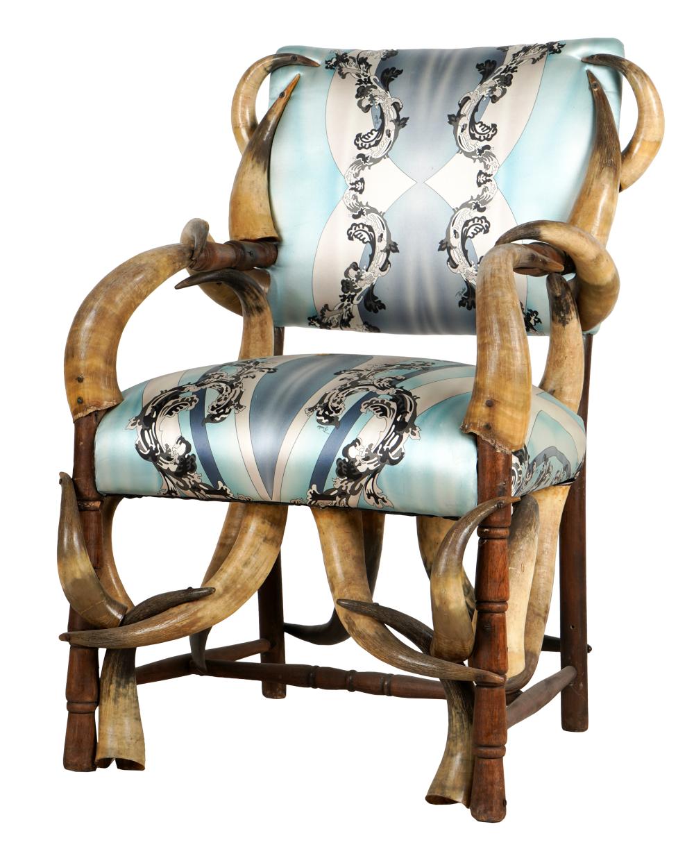 Appraisal: FABRIC-UPHOLSTERED HORN ARMCHAIRunsigned Condition silk upholstery stained inches wide inches