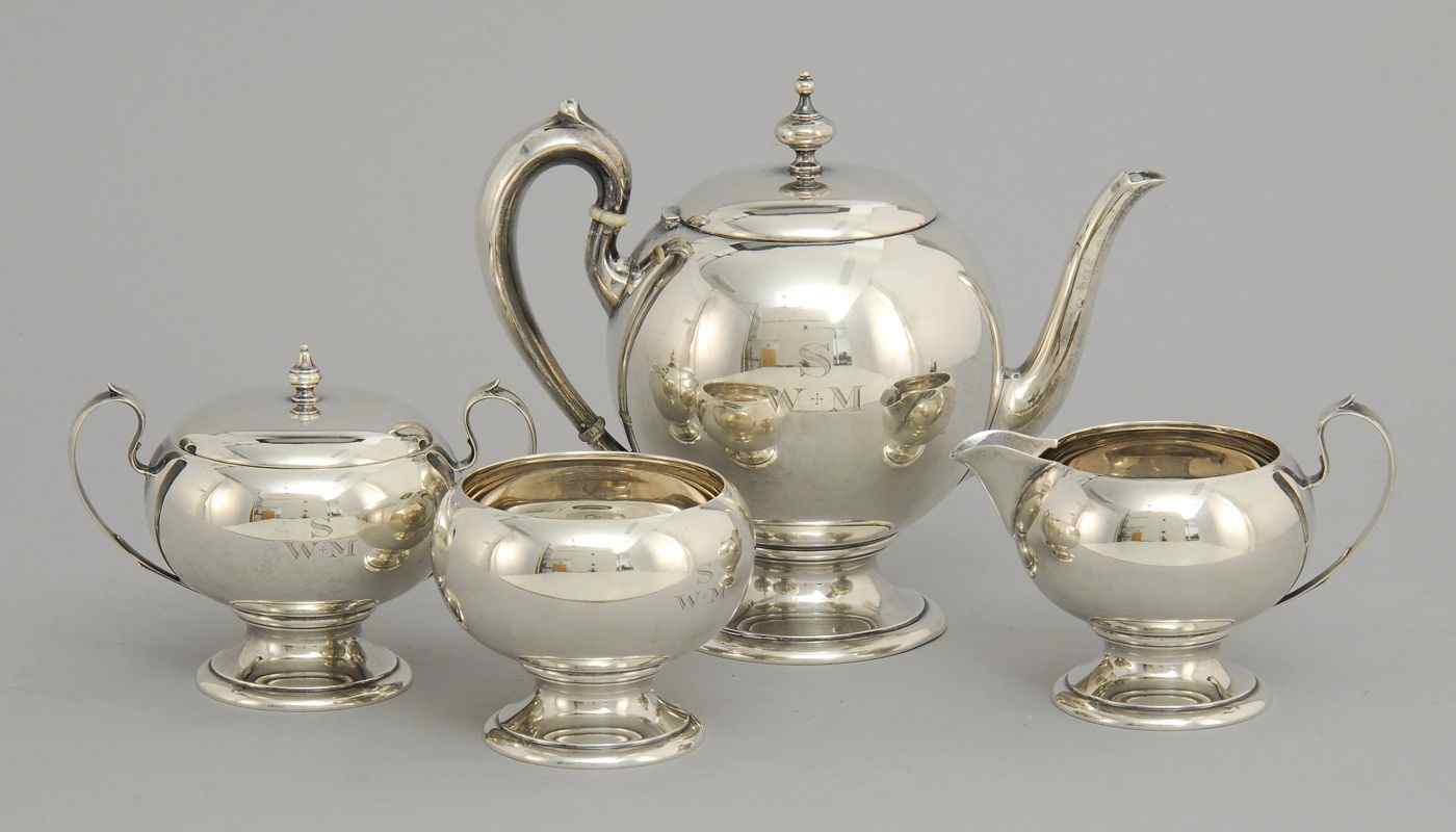 Appraisal: REDLICH COMPANY FOUR-PIECE STERLING SILVER TEA SETIn bulbous form with