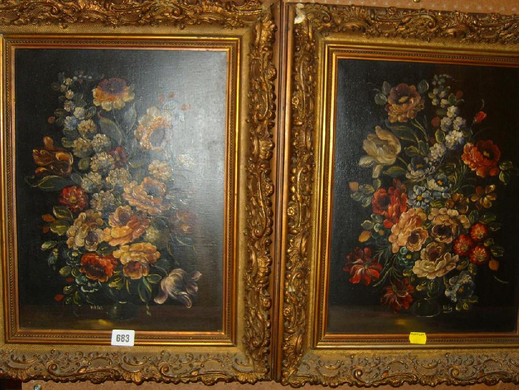 Appraisal: A pair of oil paintings on canvas of floral still