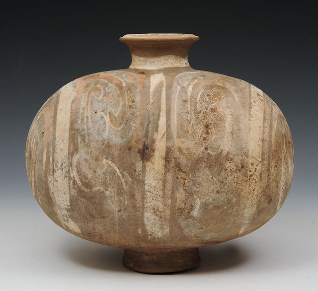 Appraisal: A CHINESE OVOID JAR with simple polychrome decoration Han period