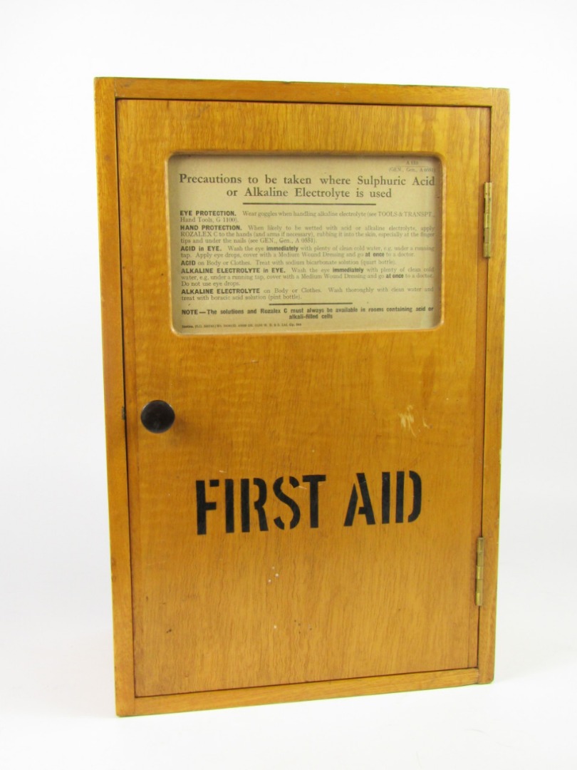 Appraisal: A Remploy oak First Aid cabinet the glass fronted door