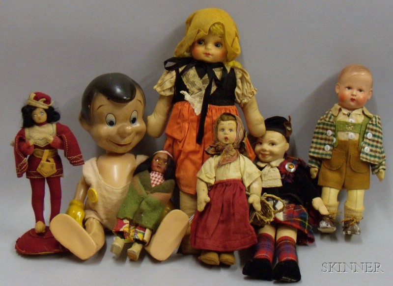 Appraisal: Seven Assorted Costume Dolls s Knickerbocker composition Pinocchio jointed at