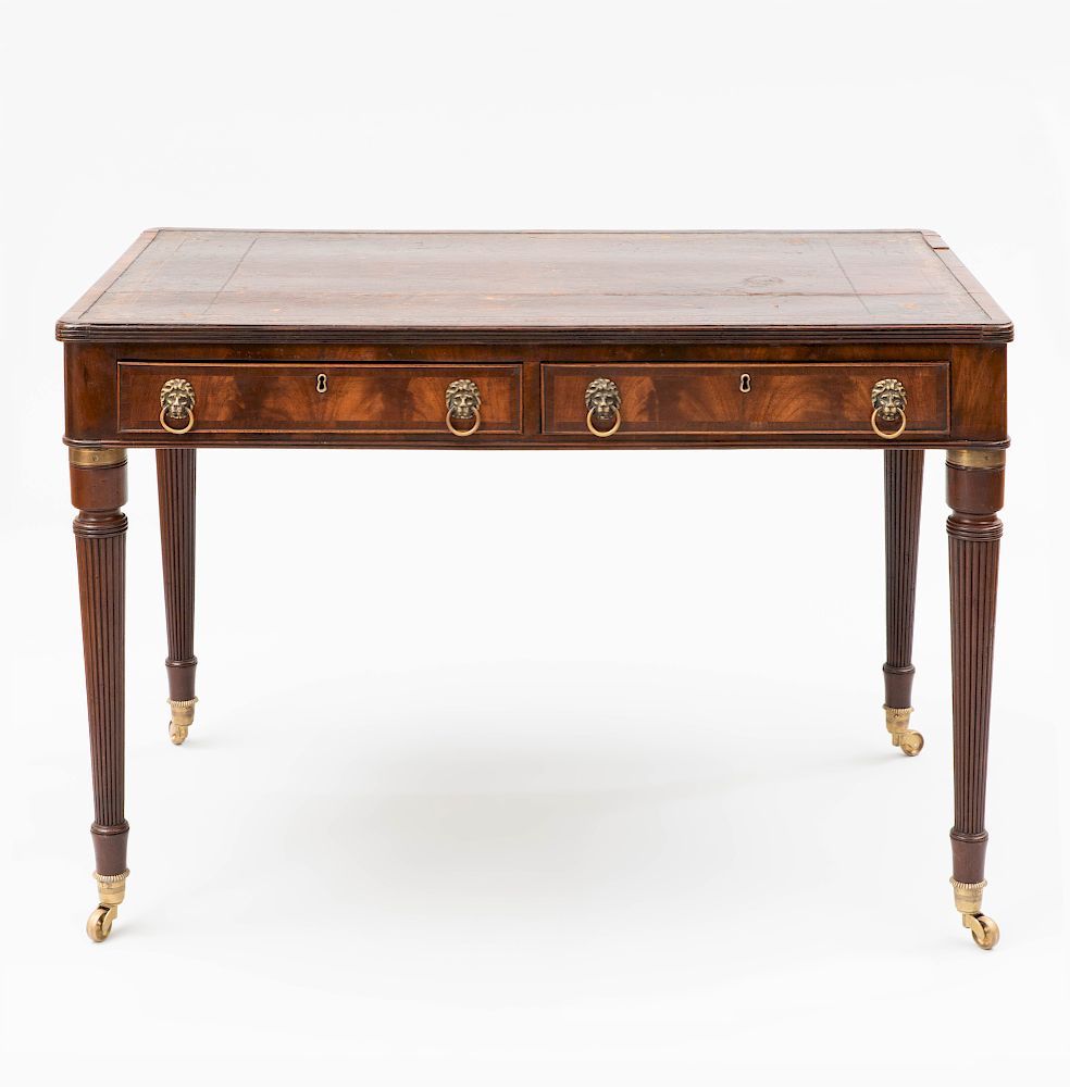 Appraisal: Regency Carved Mahogany Writing Desk Fitted with a leather-lined writing