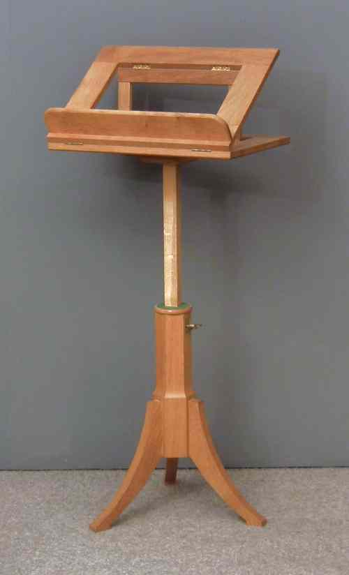 Appraisal: A modern oak adjustable reading stand on tripod base ins