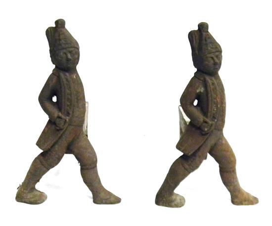 Appraisal: Pair th C figural cast-iron andirons depicting marching Hessian soldiers