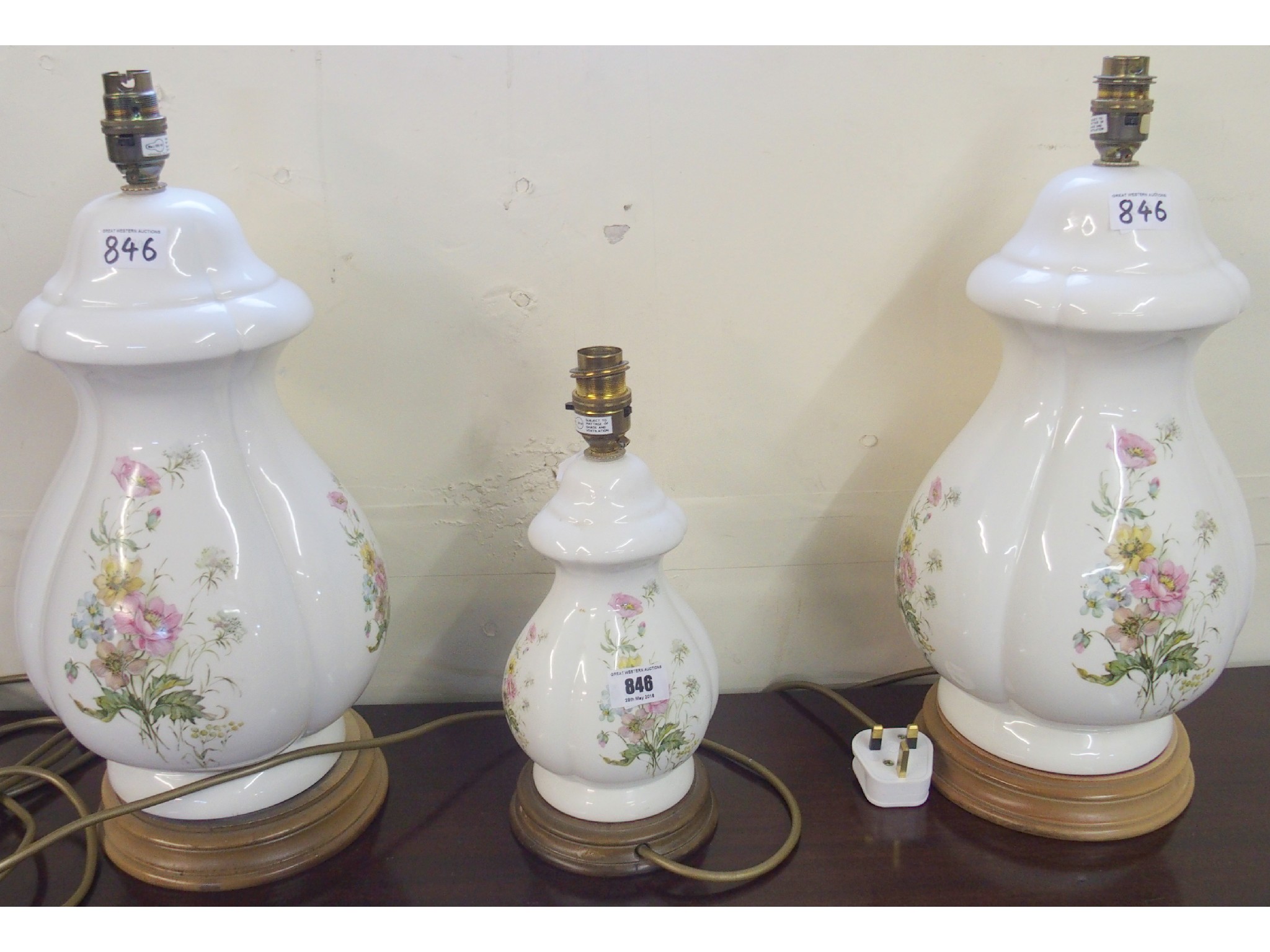 Appraisal: Three floral ceramic table lamps