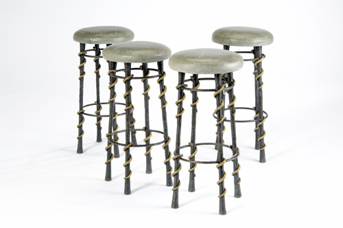 Appraisal: KARL SPRINGER Set of four steel barstools with leather upholstered