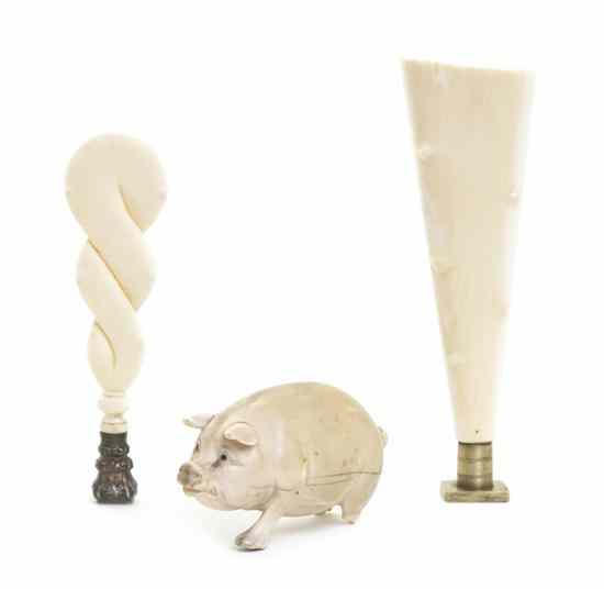 Appraisal: A Collection of Three Continental Ivory Articles comprising a pig