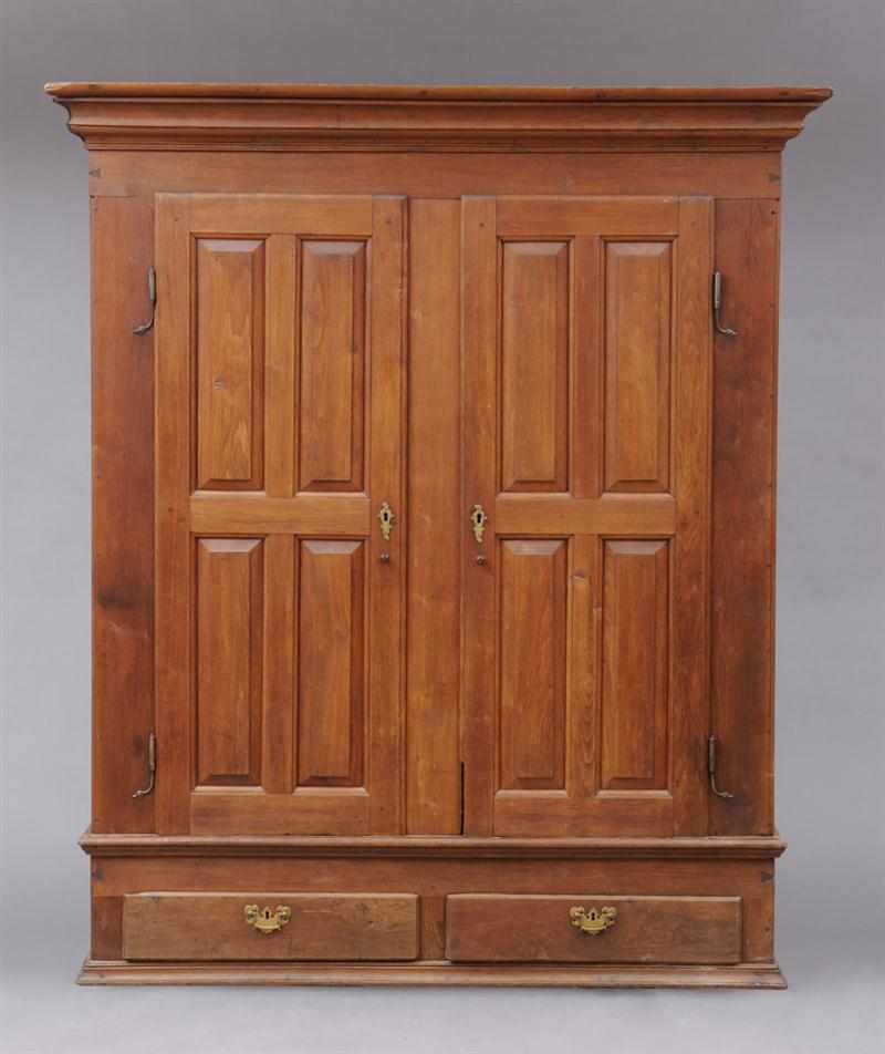 Appraisal: PENNSYLVANIA WALNUT SCHRANK LANCASTER COUNTY The rectangular molded cornice over