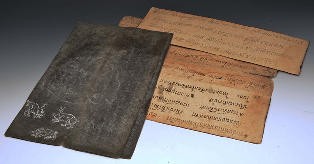 Appraisal: TWO KHMER FOLDING PANELS OF SCRIPT cm across