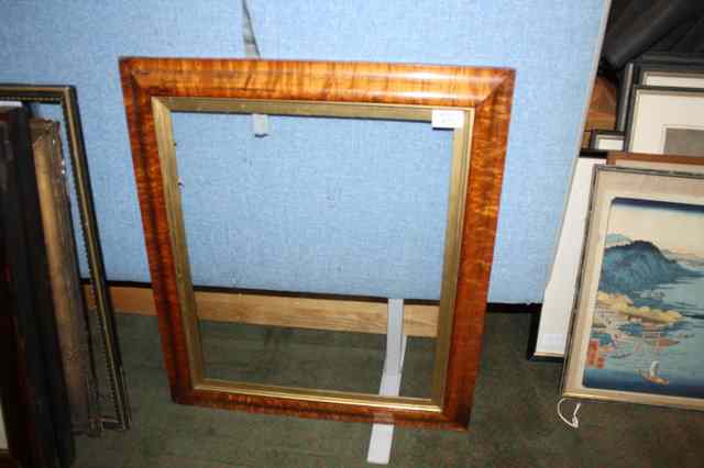 Appraisal: A th Century maple frame with cushion moulded border and