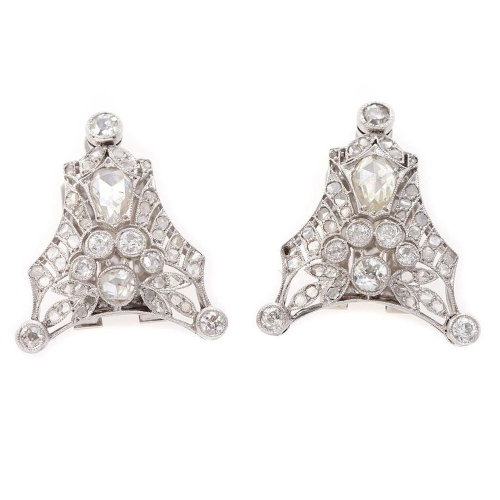 Appraisal: Vintage pair of diamond and platinum clip brooches set with