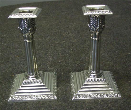 Appraisal: Pair of Victorian silver candlesticks in the from columns on