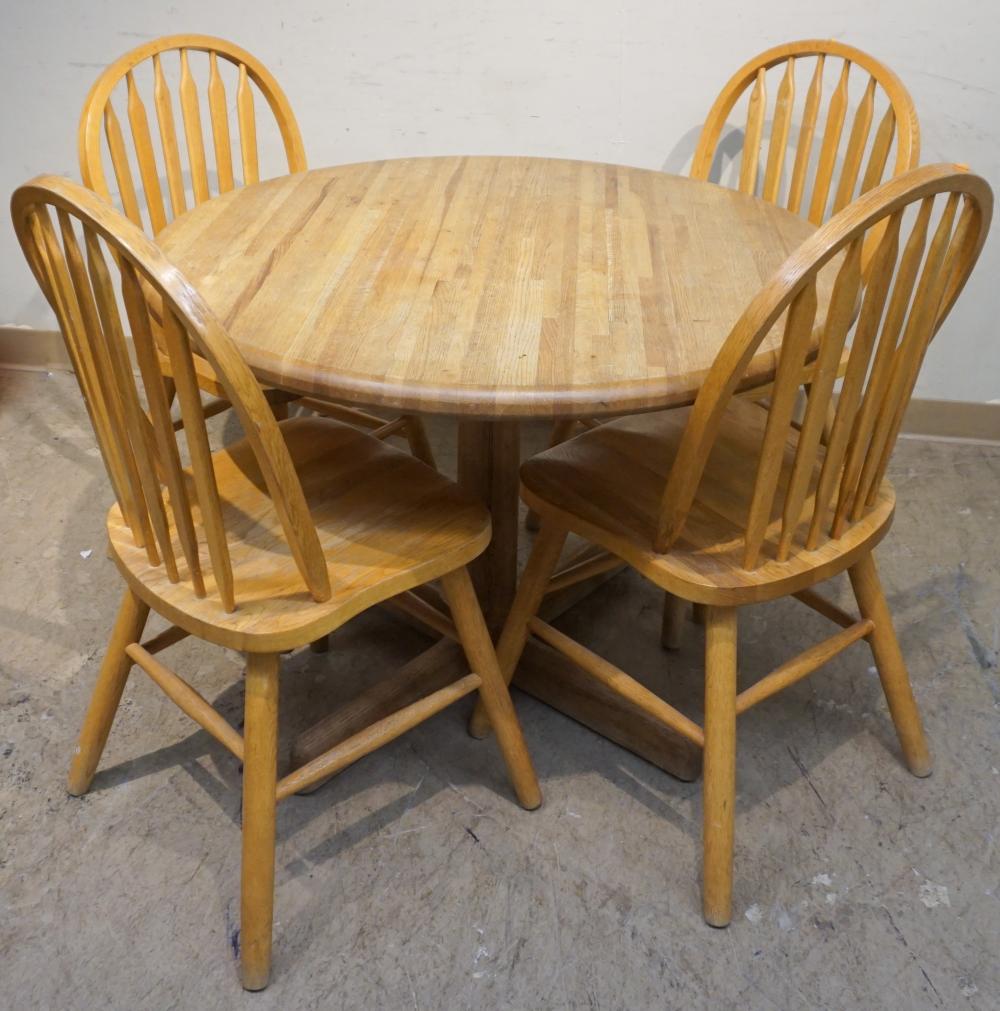 Appraisal: EARLY AMERICAN STYLE PINE DINETTE TABLE AND FOUR CHAIRS TABLE