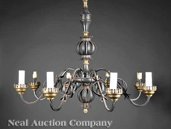 Appraisal: A Pair of Decorative Iron and Brass Eight Light Chandeliers