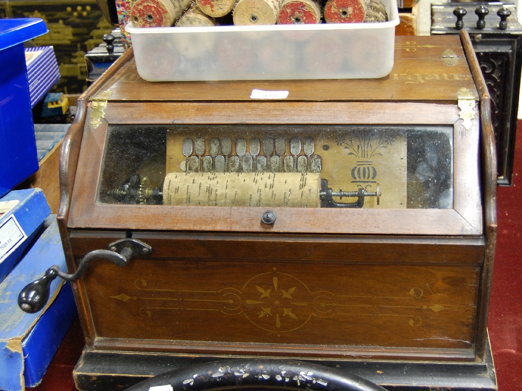 Appraisal: A th century walnut 'Concert Roller Organ' with cylinders