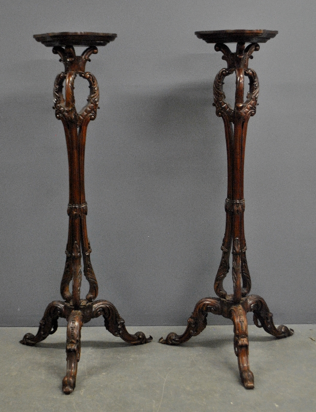 Appraisal: - Pair of ornately carved mahogany pedestals th c h