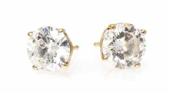 Appraisal: A Pair of Karat Yellow Gold and Diamond Stud Earrings