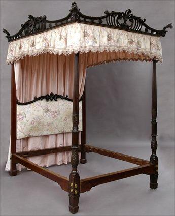 Appraisal: GEORGE III MAHOGANY FOUR-POSTER BED The carved and pierced cresting