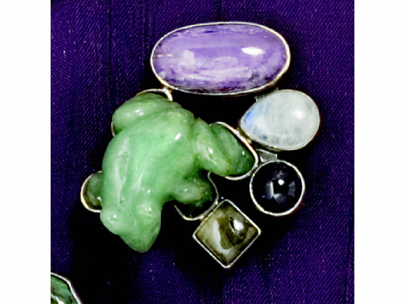 Appraisal: CARVED STONE BROOCH With frog motif and bezel set natural