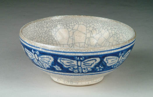 Appraisal: SMALL DEDHAM POTTERY BOWL WITH BUTTERFLY DECORATION Blue and white