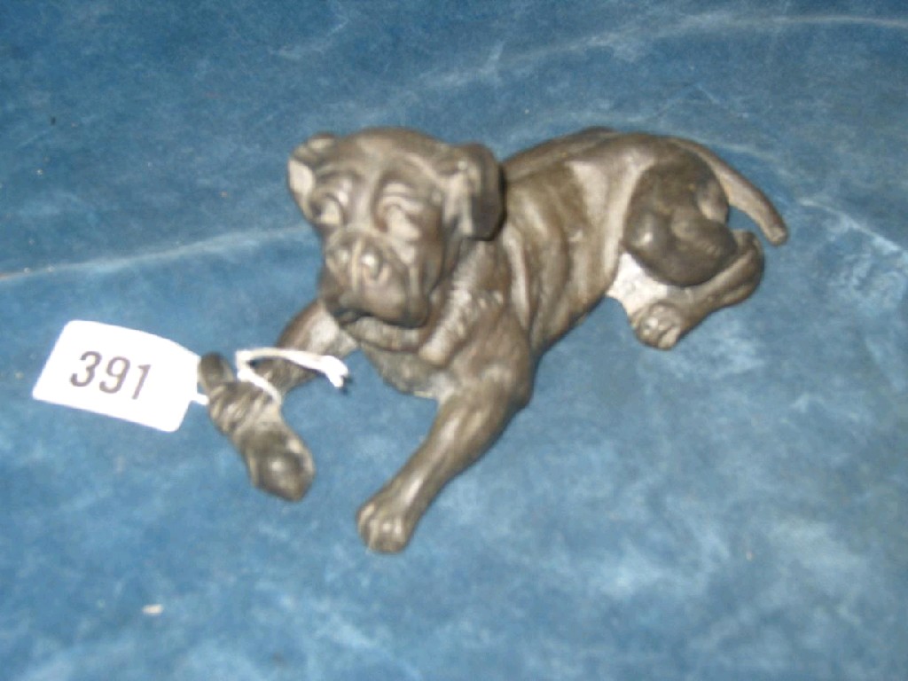 Appraisal: A cast Spelter figure of a recumbent dog