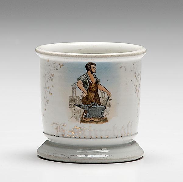 Appraisal: BLACKSMITH'S OCCUPATIONAL SHAVING MUG porcelain with polychrome painted scene of