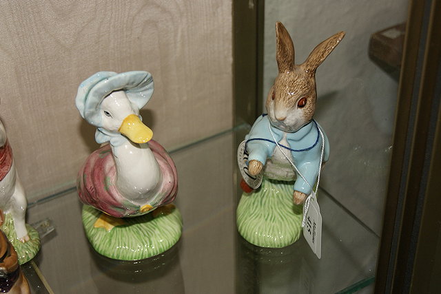 Appraisal: TWO BESWICK BEATRIX POTTER LIMITED EDITION PORCELAIN MODELS of Peter