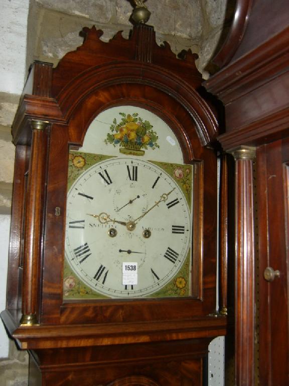 Appraisal: A Regency mahogany longcase clock the case with applied moulding