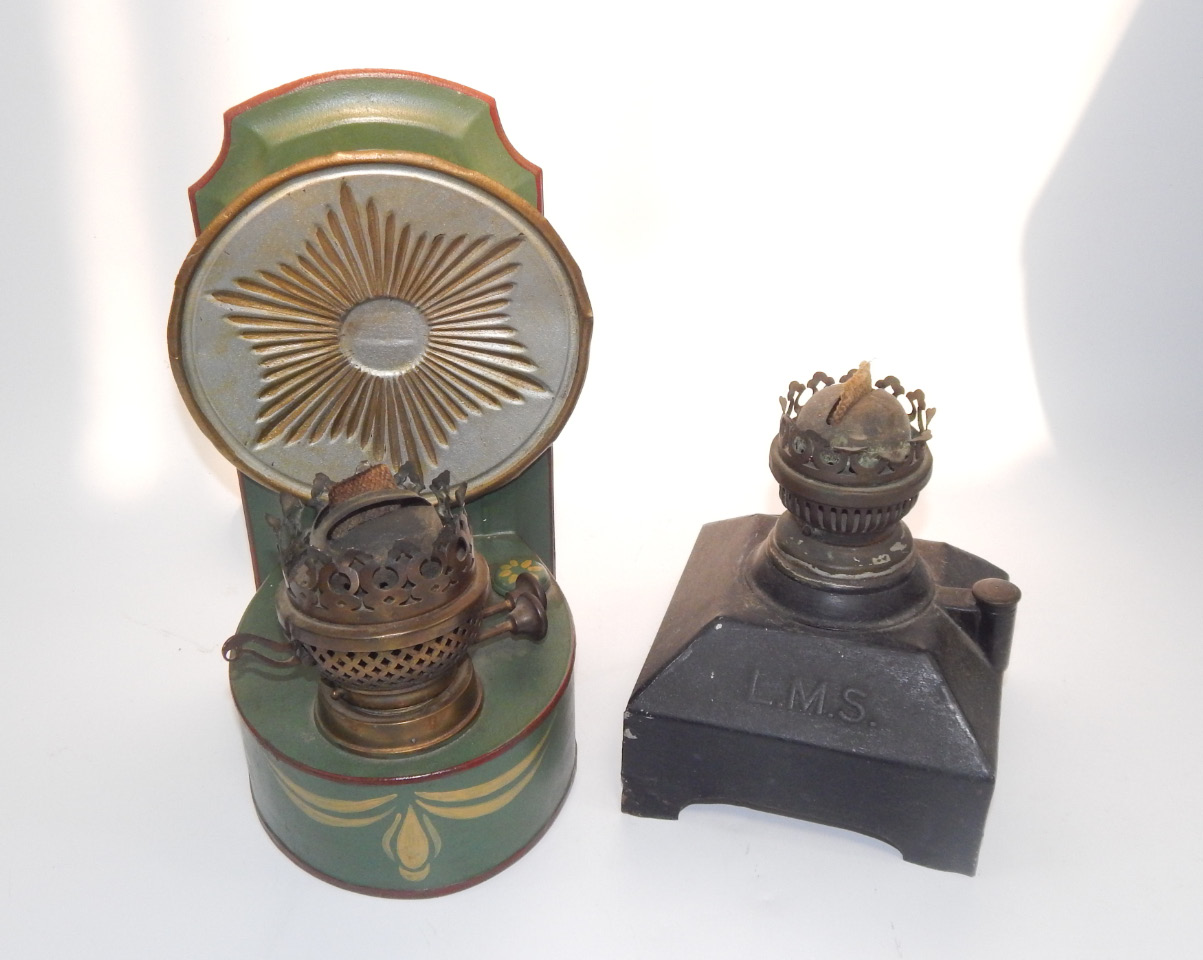 Appraisal: An LMS railway lamp with a glass chimney and a