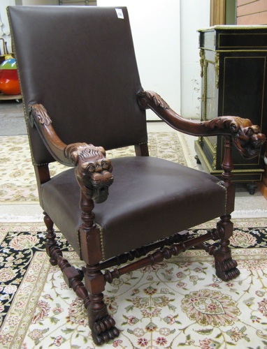 Appraisal: A PAIR OF FLEMISH BAROQUE STYLE ARMCHAIRS of walnut construction