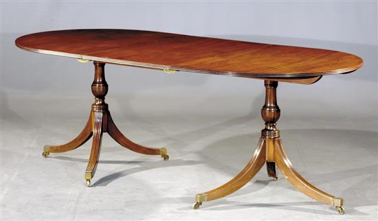 Appraisal: Regency style mahogany dining table early th centuryD-shaped banquet ends