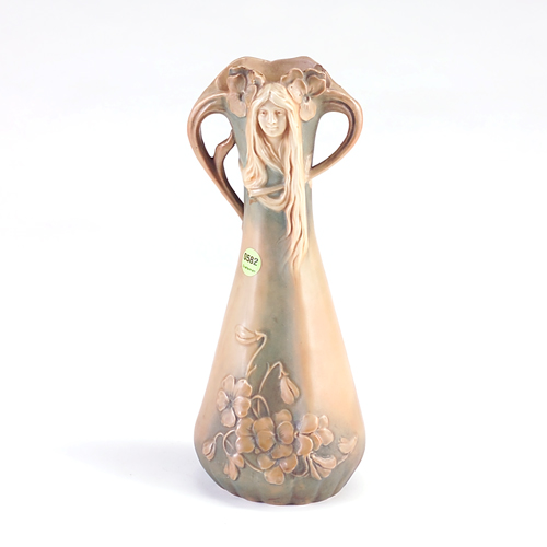 Appraisal: A STUCHLY Art Nouveau tapering vase Austrian embossed with a