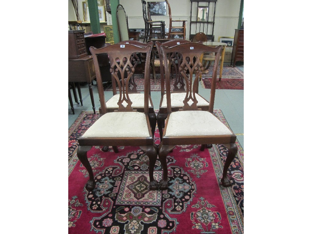 Appraisal: Four reproduction Chippendale style dining chairs