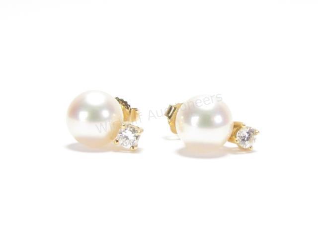 Appraisal: A pair of Mikimoto earrings each with approximately mm pearls