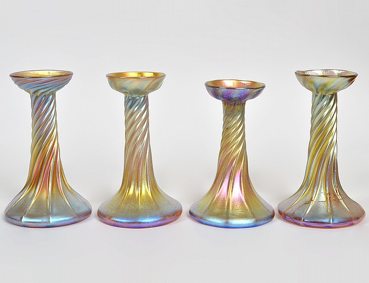 Appraisal: FOUR TIFFANY IRIDESCENT GOLD GLASS CANDLESTICKSCirca Three incised L C