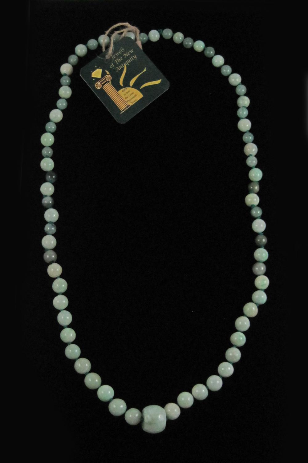 Appraisal: GREEN JADE AND GREEN AVENTURINE BEAD NECKLACE The hand-knotted necklace