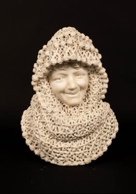 Appraisal: A Victorian marble bust of a girl with lace shawl