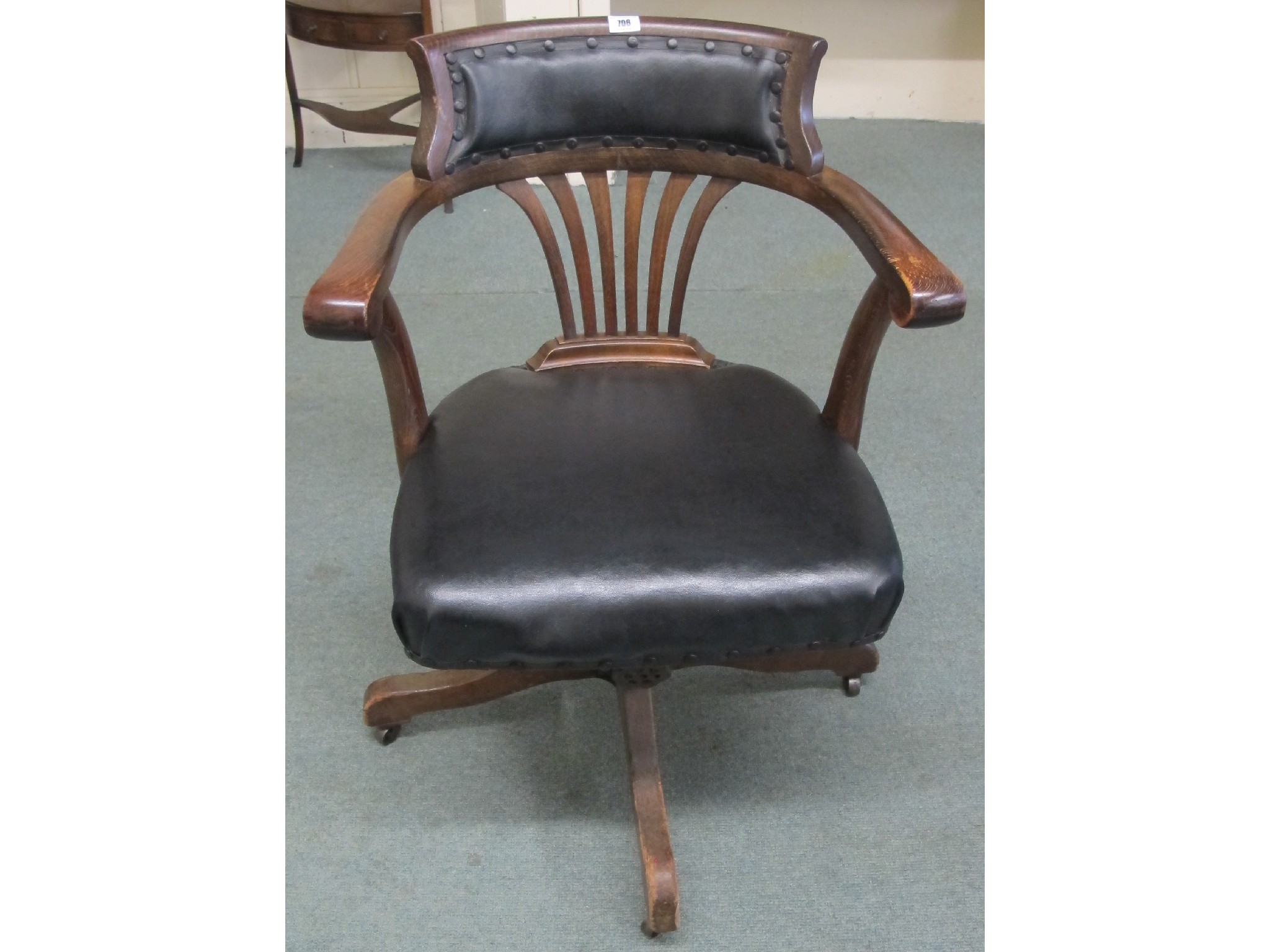 Appraisal: An early th century swivel office chair