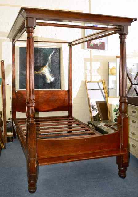 Appraisal: A GEORGE IV FULL TESTER BEDSTEAD in the manner of