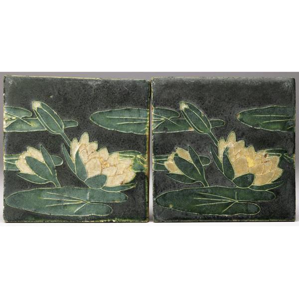 Appraisal: GRUEBY Two square buff clay tiles decorated in cuenca and