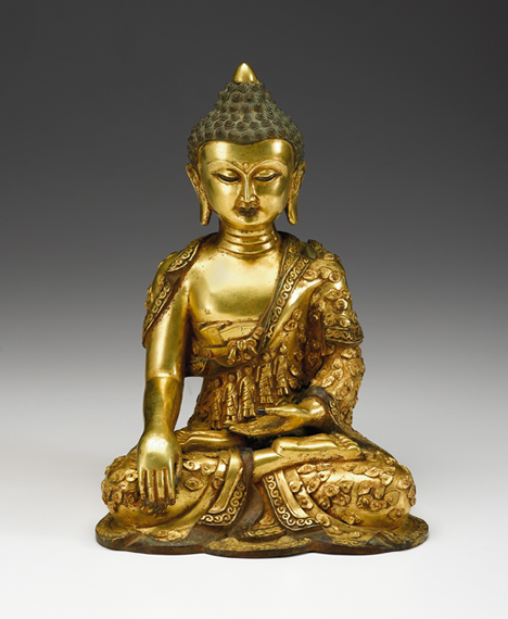 Appraisal: Tibetan gilt bronze seated Buddha late th early th century