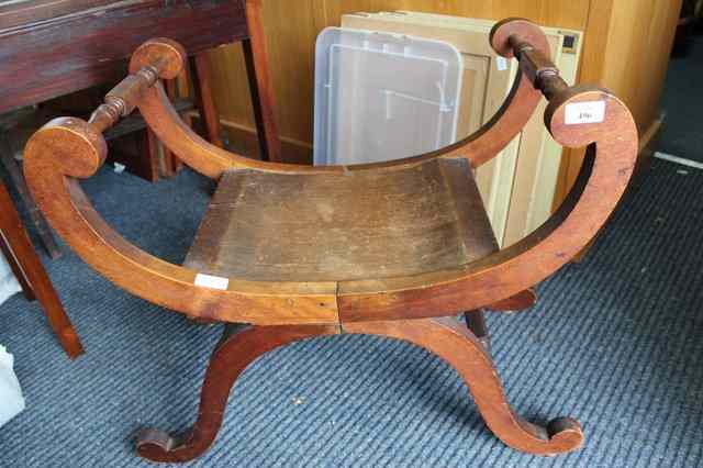 Appraisal: AN ANTIQUE MAHOGANY SCROLLING 'X' FRAME STOOL with solid seat