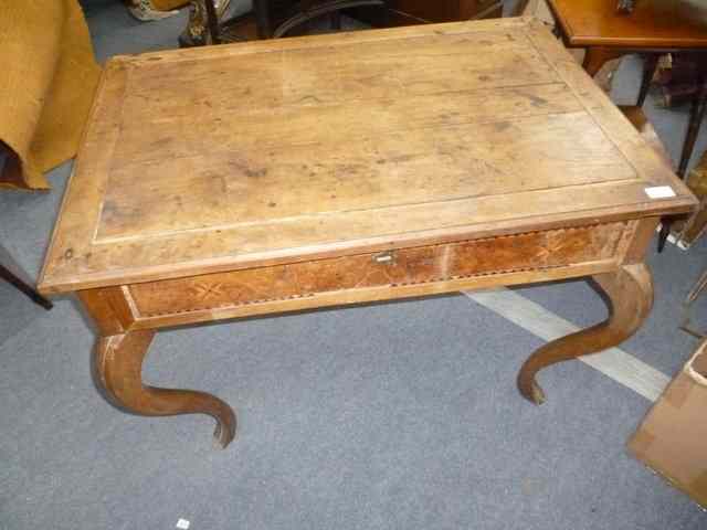 Appraisal: A CONTINENTAL WALNUT SIDE TABLE with parquetry inlay to the