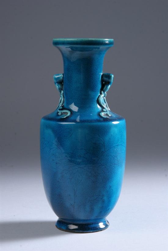 Appraisal: CHINESE TURQUOISE PORCELAIN ROULEAU VASE th century Incised foliate decoration