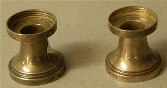 Appraisal: Pair of George VI silver squat candlesticks Sheffield ozs h