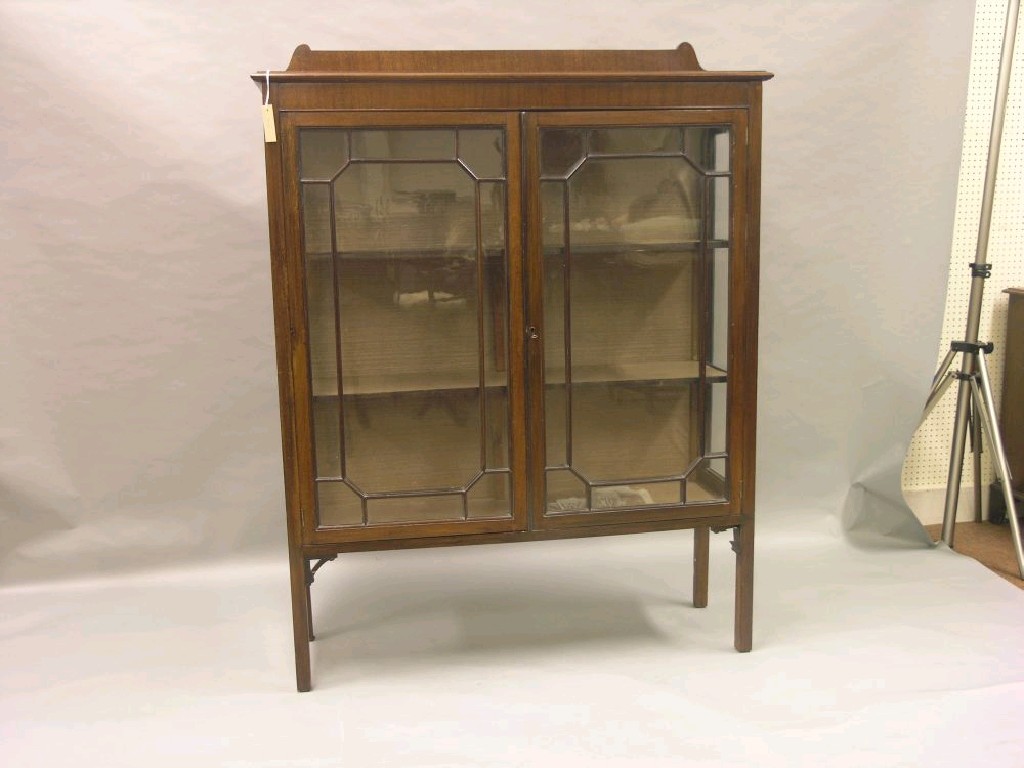 Appraisal: A George V mahogany display cabinet pair of astragal glazed