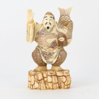 Appraisal: Japanese Carved Bone Polychrome Fisherman Figurine Japanese Carved Bone Polychrome