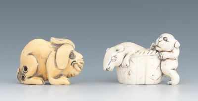 Appraisal: Two Carved Ivory Netsuke of Animals Containing a mythical dog-shape